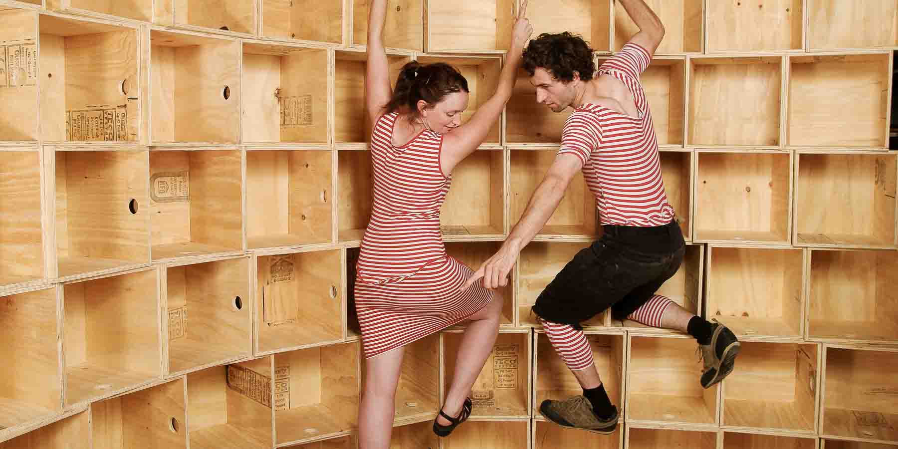 Laura and Jem clowning around on plywood crates