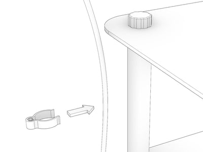 A KittaParts cable clip being fitted around a dowel at the back of a shelving unit to hold a cable